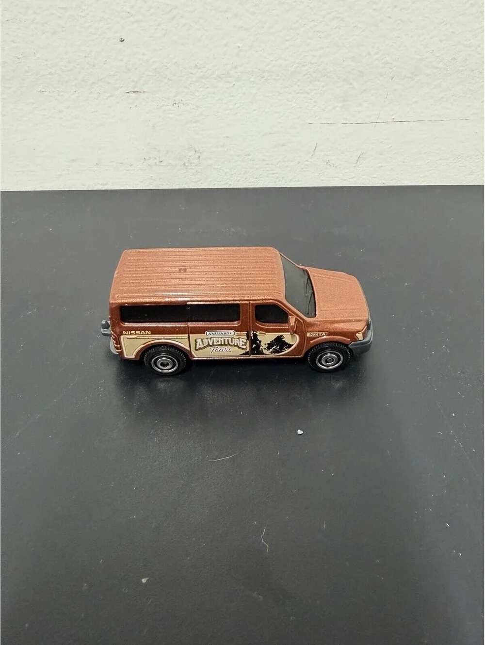 2014 Matchbox Nissan NV Passenger Van Adventure Tours New Zealand Tourist